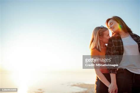 lesbians beach photos and premium high res pictures getty images