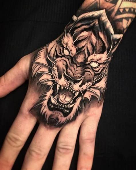 15 Best Tiger Head Tattoo Designs And Ideas PetPress Hand Tattoos
