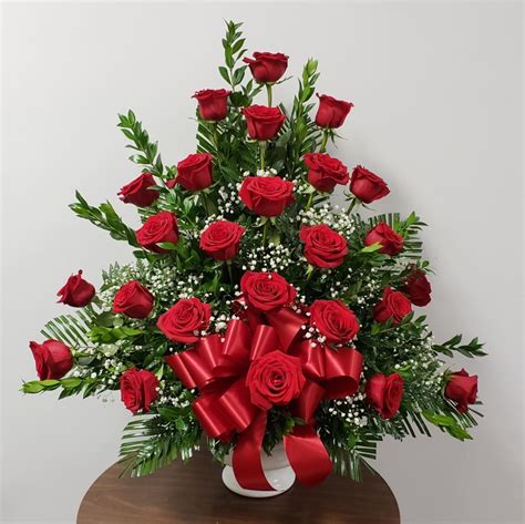 All Rose Funeral Arrangement By Aandm Floral Express
