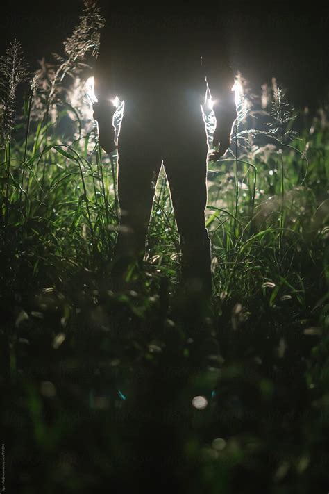 Danger Dark Silhouette Of A Man In A Field By Stocksy Contributor