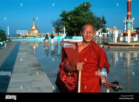 Buddhist Monk Pilgrim At The Golden Rock In Kyaikto Myanmar Stock Photo Alamy