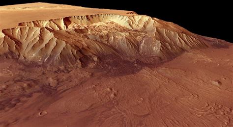 Solar Systems Deepest Canyon Sinks Miles Into Mars Wired