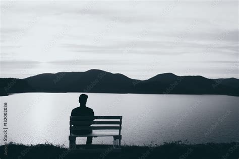The Silhouette Of Boy Sitting Alone Concept Of Lonely Sad Alone