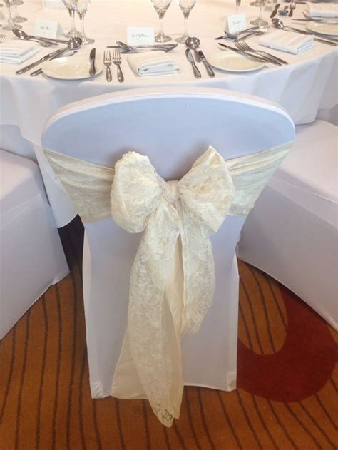 Ivory Taffeta And Ivory Lace Sashes On White Lycra Stretch Chair Covers