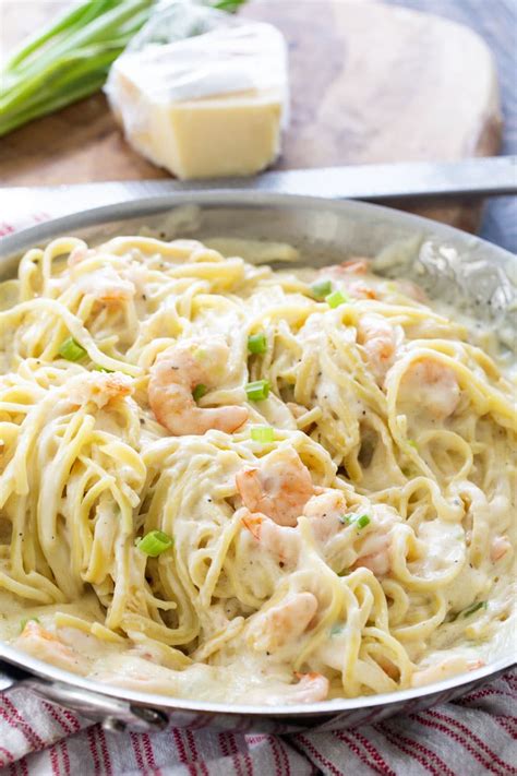 This easy shrimp alfredo recipe has gotten rave reviews from my family, our amazing readers, and i know it will at portion the pasta and shrimp into 4 bowls. Cheesy Garlic Shrimp Alfredo - Spicy Southern Kitchen
