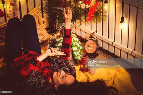Woman Lying At Homechristmas Time High Res Stock Photo Getty Images