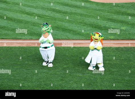 Heater And Gem The Dayton Dragons Mascots Perform For Baseball Fans