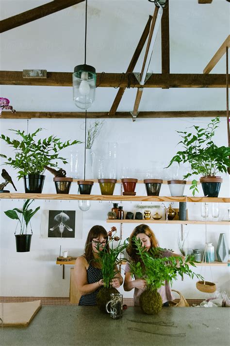 Two Girls In A Flower Shop Del Colaborador De Stocksy Bruce And Rebecca Meissner Stocksy