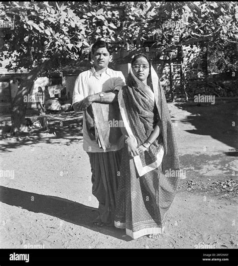 Old Vintage 1900s Black And White Picture Of Indian Couple Portrait Man Woman Standing Husband