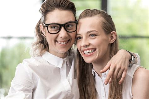 Happy Lesbian Couple Hugging Each Other And Looking Aside Stock Image Image Of People