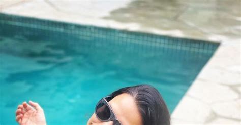 Heavily Pregnant Neha Dhupia Flaunts Her Curves As She Enjoys Pool
