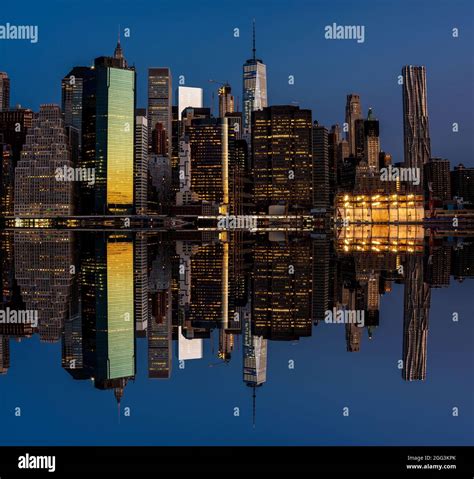 Unique New York Skyline At Night Mirrored Stock Photo Alamy