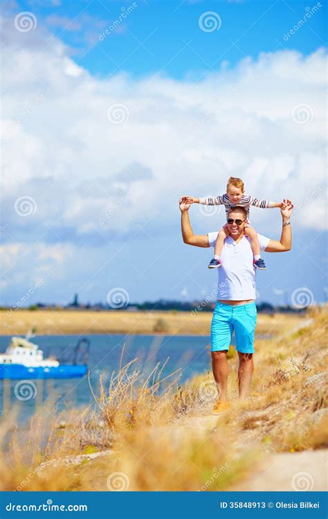 Happy Father And Son Enjoying Seaside Landscape Stock Image Image Of Outside Field 35848913