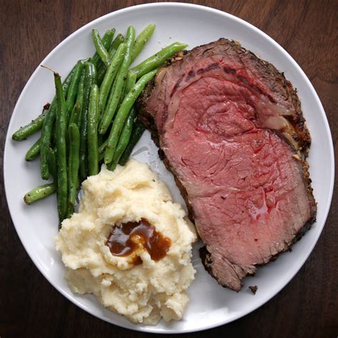 It's called a standing rib roast because to cook it, you position the roast majestically on its rib bones in the roasting pan. Prime Rib With Garlic Herb Butter Recipe by Tasty