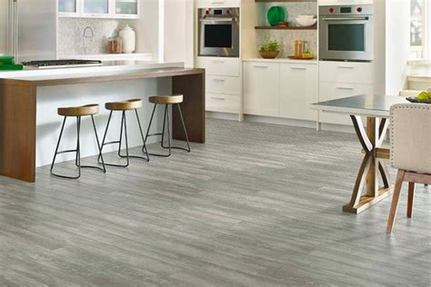 Waterproof & easy clean super easy to clean, tiles are 100% waterproof with an ixpe integrated sound reduction underlayment that does not absorb water. Waterproof Flooring | Hardwood Look Waterproof Flooring Flooring | Waterproof flooring ...