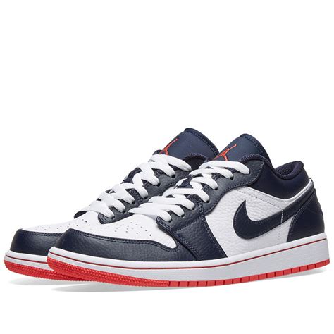 Ember glow highlights the shoe used on the insoles, jumpman tongue logos and rubber outsole. Air Jordan 1 Low Obsidian, Ember Glow & White | END.