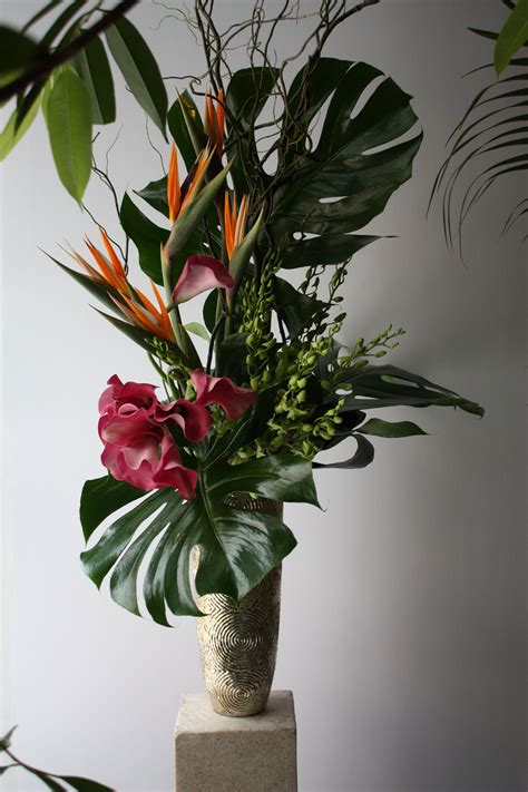 Tall Tropical Flower Arrangement Composition Of Monstera Leaves Birds Of Tropical Flower