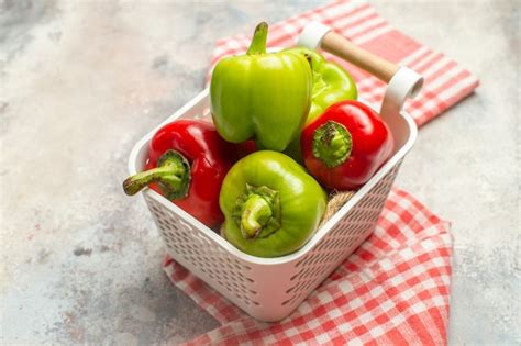 Free Photo Top View Green And Red Peppers In Plastic Basket Red White