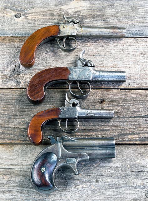 Antique Derringer Style Pistols Photograph By W Scott Mcgill Pixels