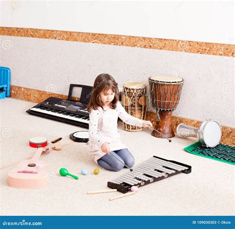 Cute Girl Playing On The Xylophone Stock Image Image Of Nursery