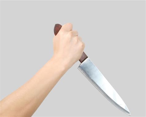 Premium Photo Hands Holding Knife Isolated Murder Concept