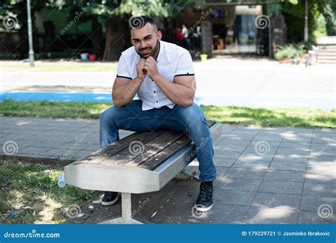 Handsome Young Man In Park Sitting On Bench Stock Image Image Of
