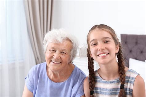 Happy Cute Girl With Her Grandmother Stock Photo Image Of Lady