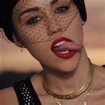 Miley Cyrus Licks White Cream
