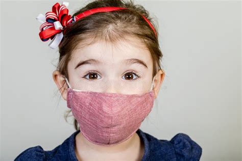 Little Girl Has Fabric Mask Protect Herself From Coronavirus Covid 19