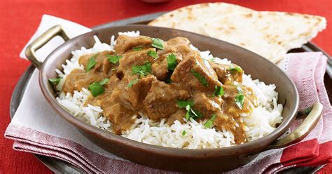 Melt half the ghee in a large saucepan over high heat and brown the lamb, then set aside on a plate. Slow-cooked lamb curry