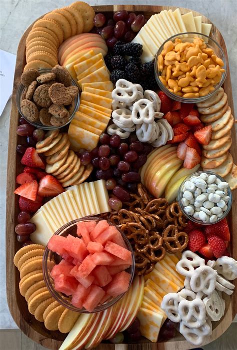Candy puns are the best way to put a graduation party food spin on normally ordinary candy. Kid friendly cheese board | Party food platters, Food ...