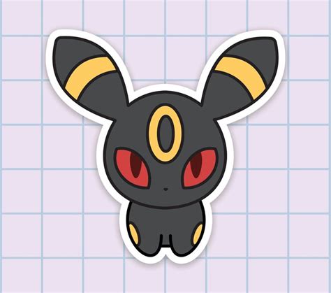 A Black And Yellow Pokemon Sticker With Red Eyes