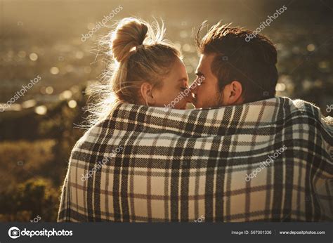 This Moment Is Quite Special Shot Of An Affectionate Couple Wrapped In A Blanket While Spending