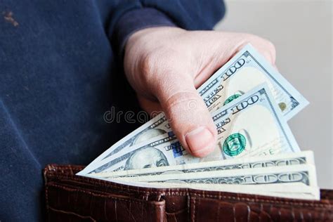 Hands Taking Out Money From Wallet Concept Of Savings Salary Payment