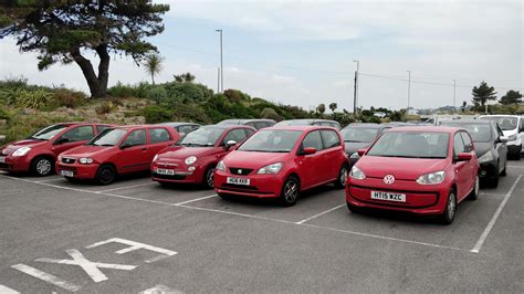 This Row Of Red Cars Parked Coincidentaly Next To Eachother R