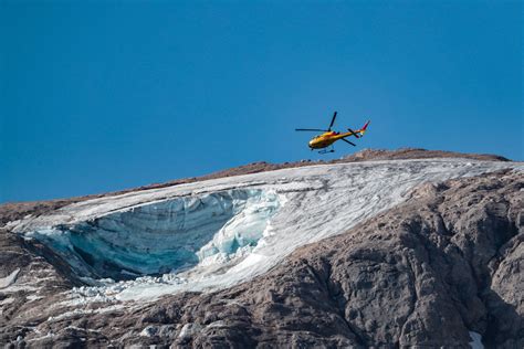 The Scene Following A Deadly Ice Avalanche In The Italian Alps The