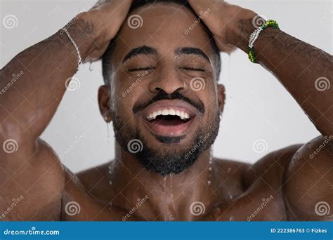 Handsome Mixed Race Black Man Relaxing And Taking Shower Stock Image