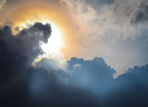 The Sun Hiding Behind The Clouds Stock Photo Image Of High Deep