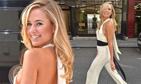 Kimberley Garner Shows Off Sideboob In A Cream And Black Jumpsuit