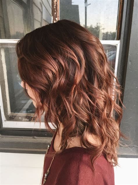 This sleek pixie cut looks amazing with this stunning auburn color. 20 Photos Auburn Medium Hairstyles