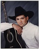 [Tracy Byrd Holding a Guitar] - The Portal to Texas History
