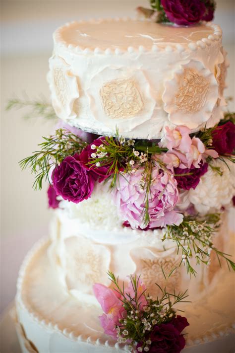 Elegant Ivory Wedding Cake With Pink Wedding Flowers