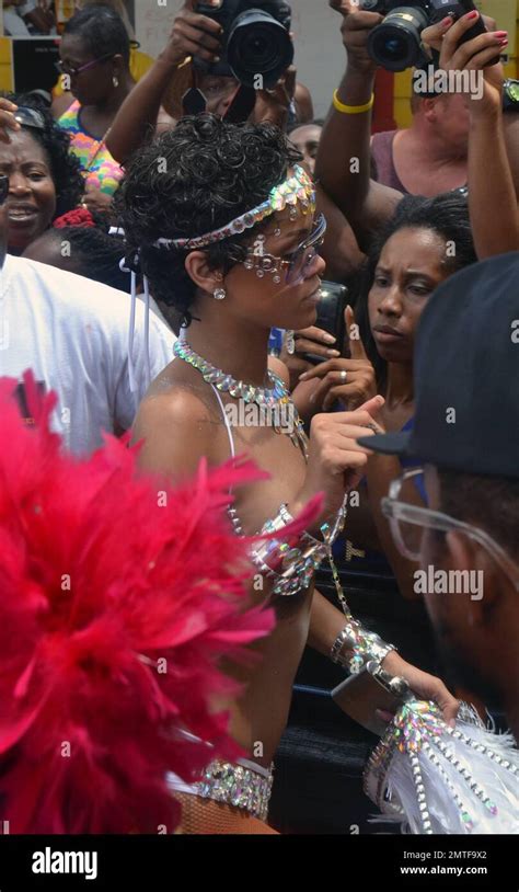 Rihanna Nearly Bares It All In An Extremely Skimpy Jeweled Bikini As She Attends The Kadooment