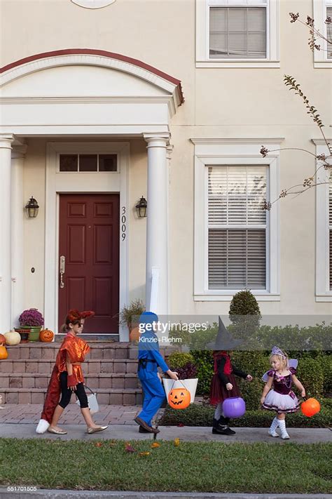 Children Going Trick Or Treating High Res Stock Photo Getty Images