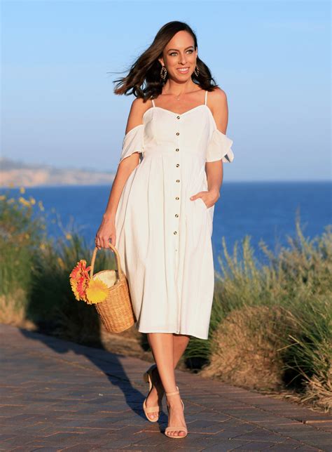 Sydne Style Shares Dresses For Summer Vacation In Lulus White Midi Dress Sydne Style