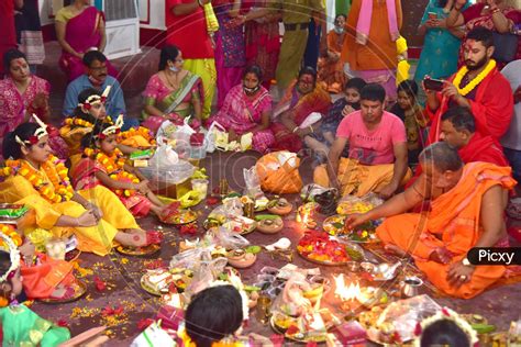Image Of Young Girls Dress As Living Goddess Kumari Participate During