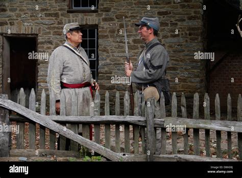 American Civil War Reenactor In Uniform Costume Near Old Period