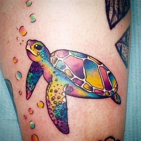 A Colorful Sea Turtle Tattoo On The Leg