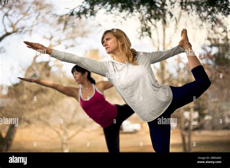 Young Women In Yoga Poses Hi Res Stock Photography And Images Alamy