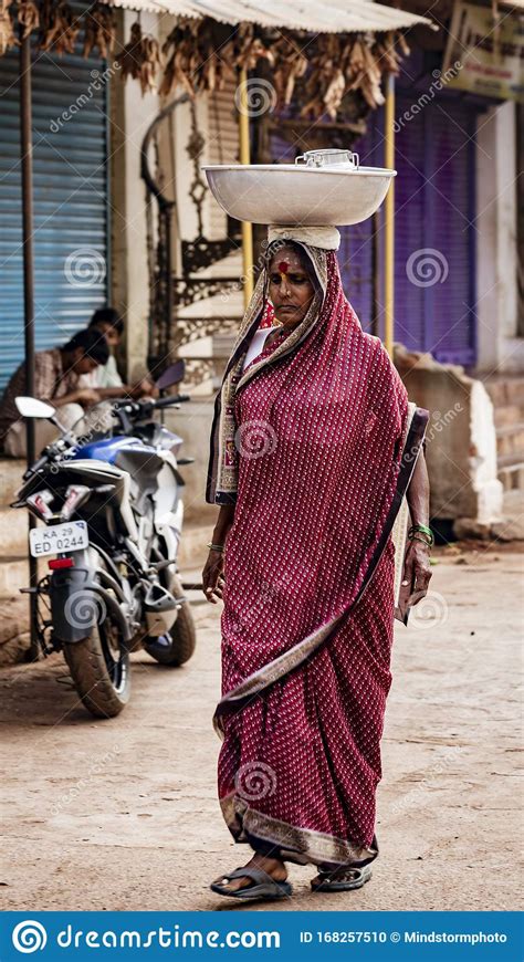 woman carries her load on her head editorial image image of labor asian 168257510